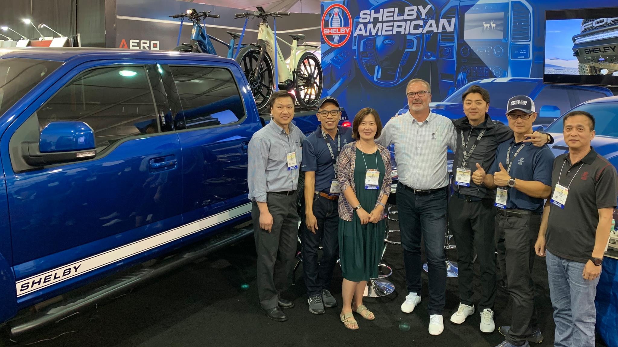 Shelby Mustang on display at the GUA B.V. Essen Motor Show stand with visitors